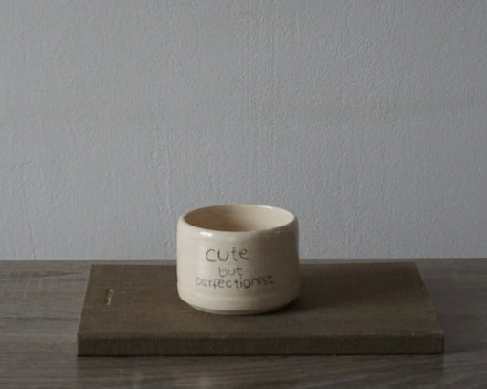 'cute but perfectionist' becher