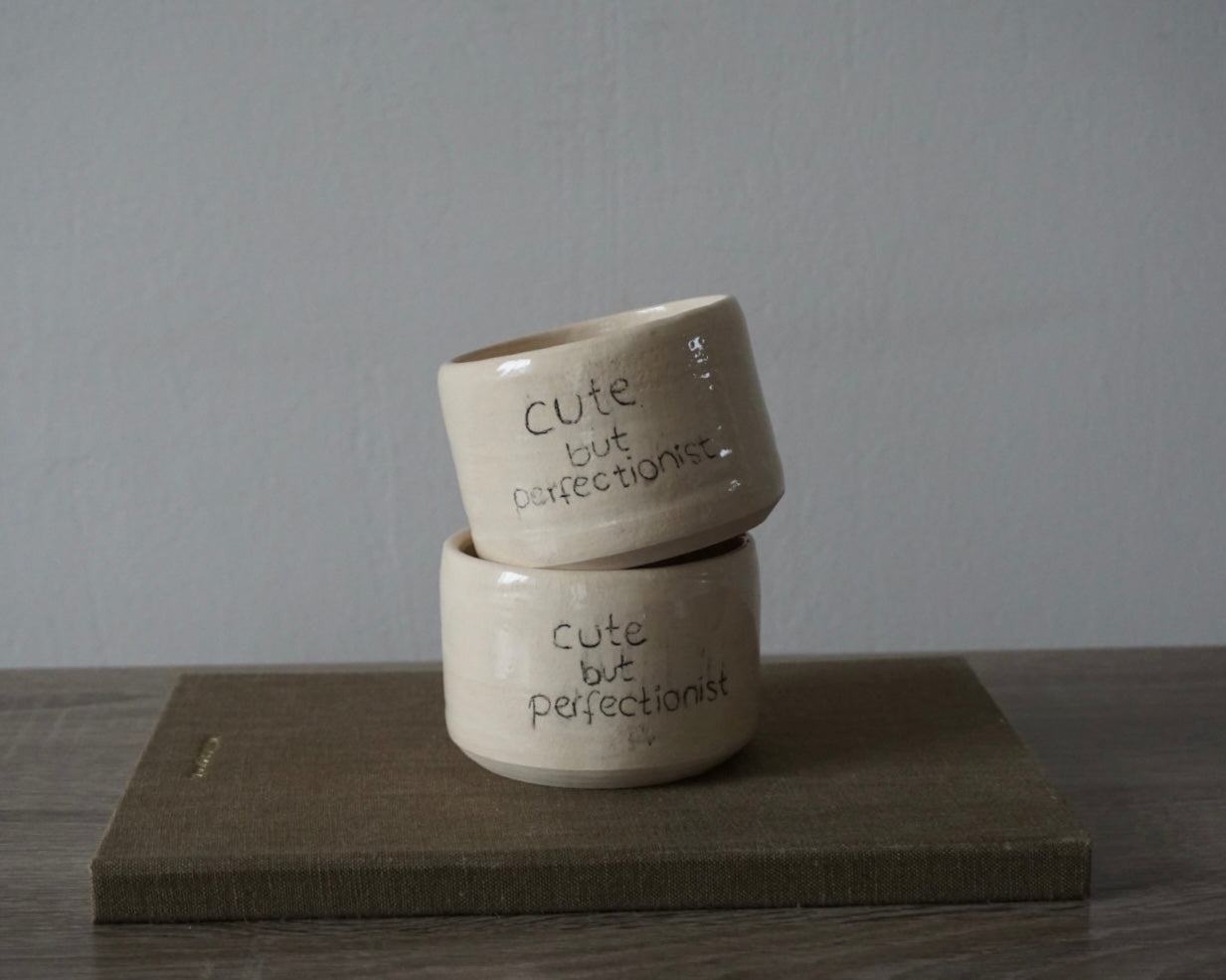 'cute but perfectionist' becher