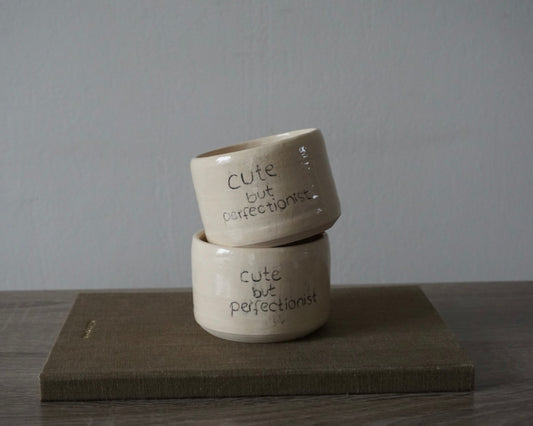 'cute but perfectionist' becher